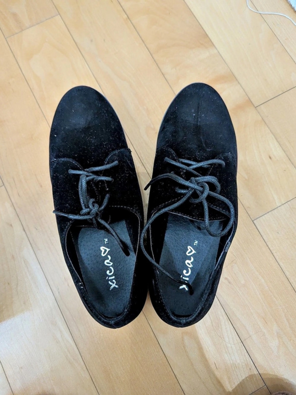Black Lace Up Shoes With Blue Soles
